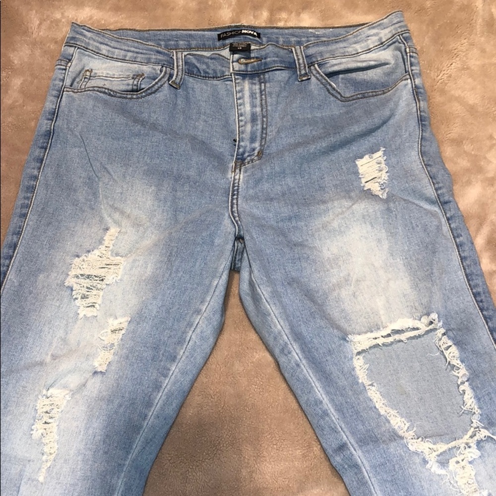 Fashion Nova light wash distressed denim